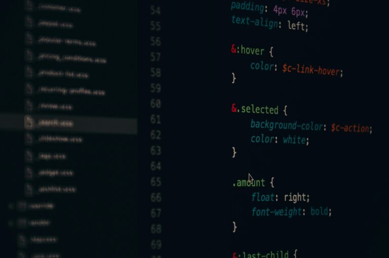 Close-up of colorful CSS code lines on a computer screen for web development.