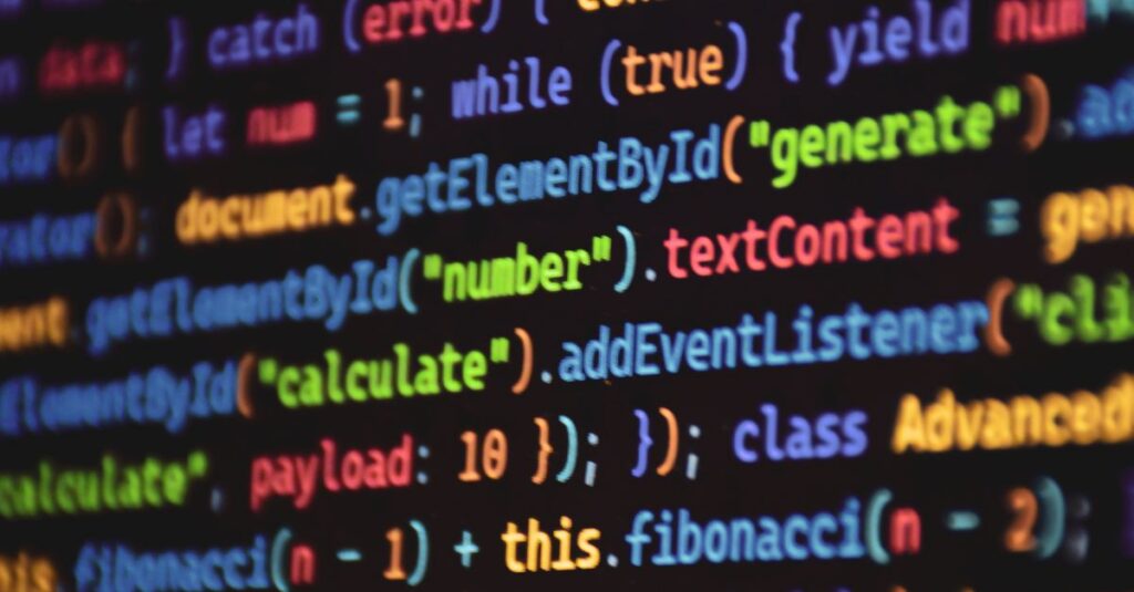 Close-up of vibrant colored JavaScript code showing functions and syntax on a dark screen.